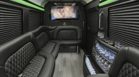 Interior of Orange Party Bus Company's 14 Passenger Sprinter Limousine in Orange