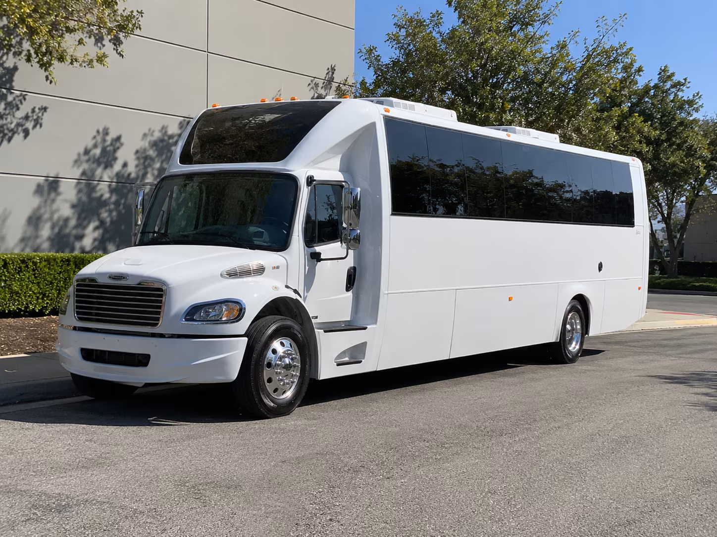 Passenger seating aboard a party bus rental serving Santa Ana
